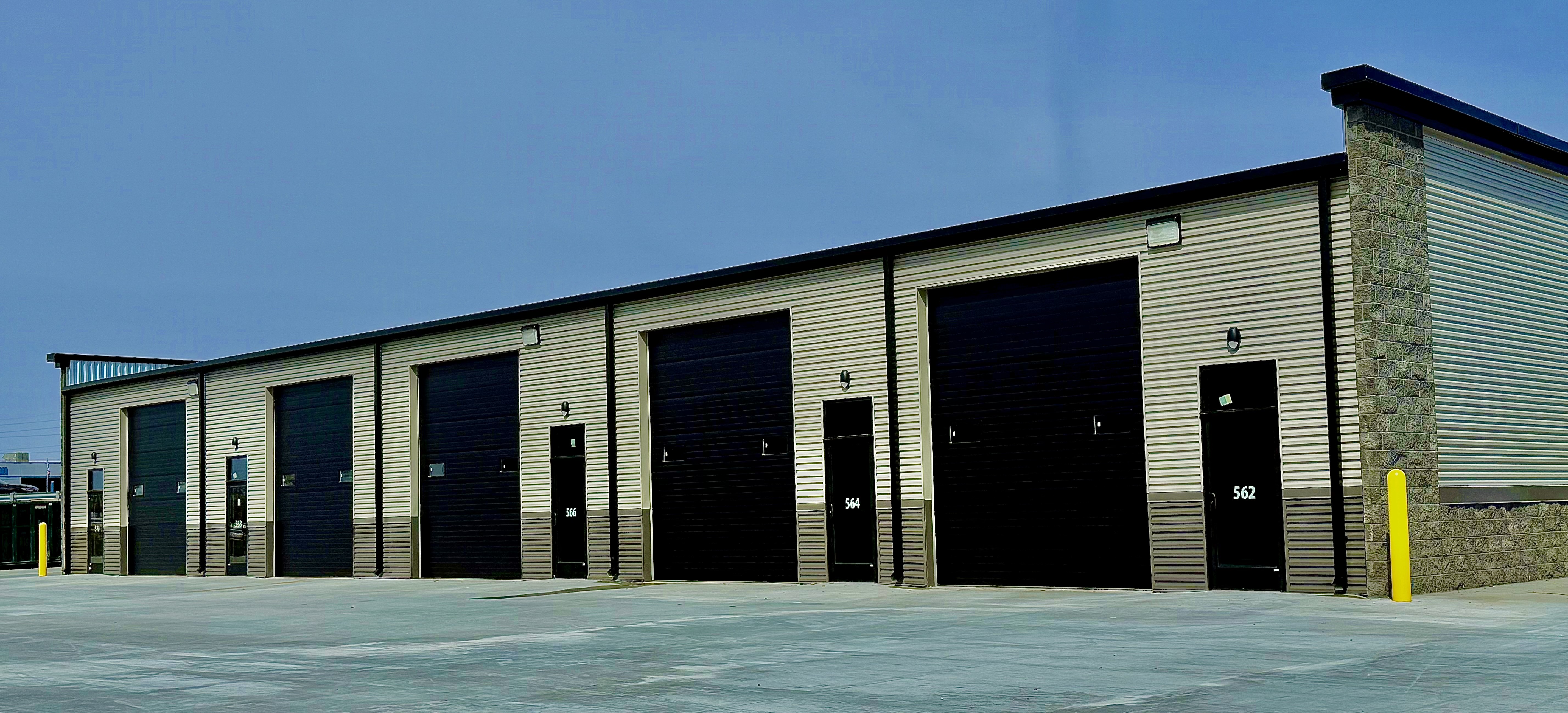 Flex space facility with roll up and swing doors