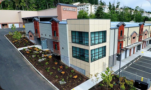 Modern multi-story self storage facility with climate-controlled units and architectural facade.